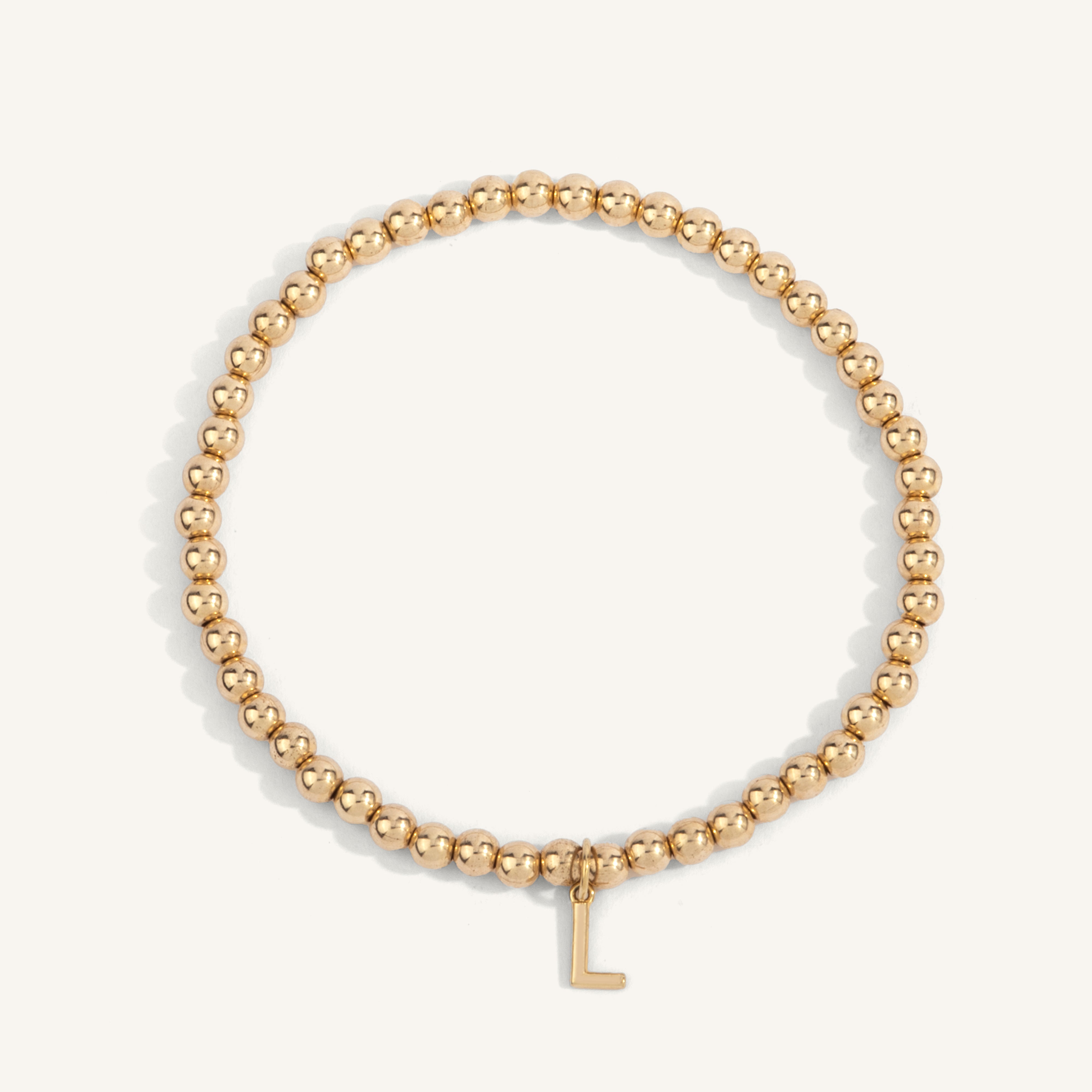 14kt Gold Filled Initial "L" Shine Bright Bead Bracelet - 4MM